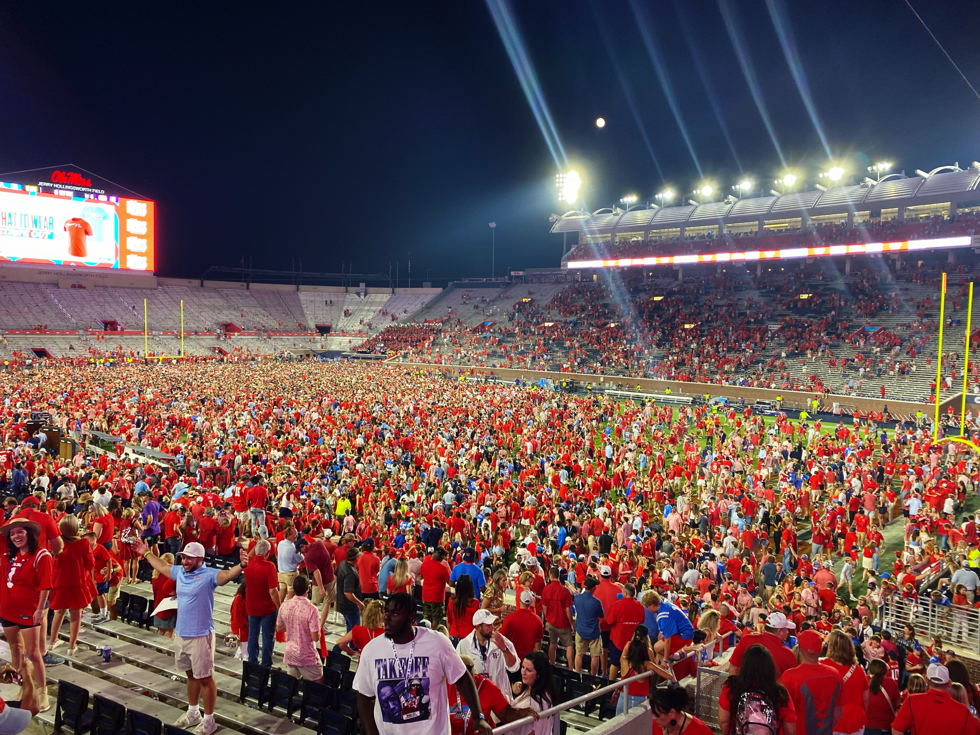 Ole Miss fans celebrate Saturday's Magnolia Bowl win by storming the field at Vaught-Hemingway Stadium.